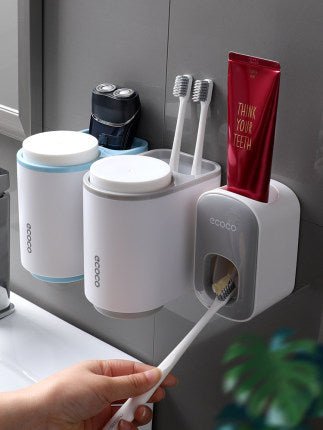 Automatic toothpaste dispenser wall mounted with toothbrush holder - Qoveri