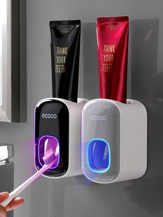 Automatic toothpaste dispenser wall mounted with toothbrush holder - Qoveri