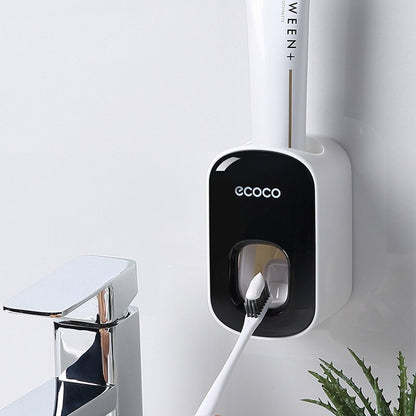Automatic toothpaste dispenser wall mounted with toothbrush holder - Qoveri