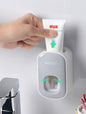 Automatic toothpaste dispenser wall mounted with toothbrush holder - Qoveri