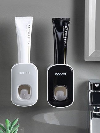 Automatic toothpaste dispenser wall mounted with toothbrush holder - Qoveri